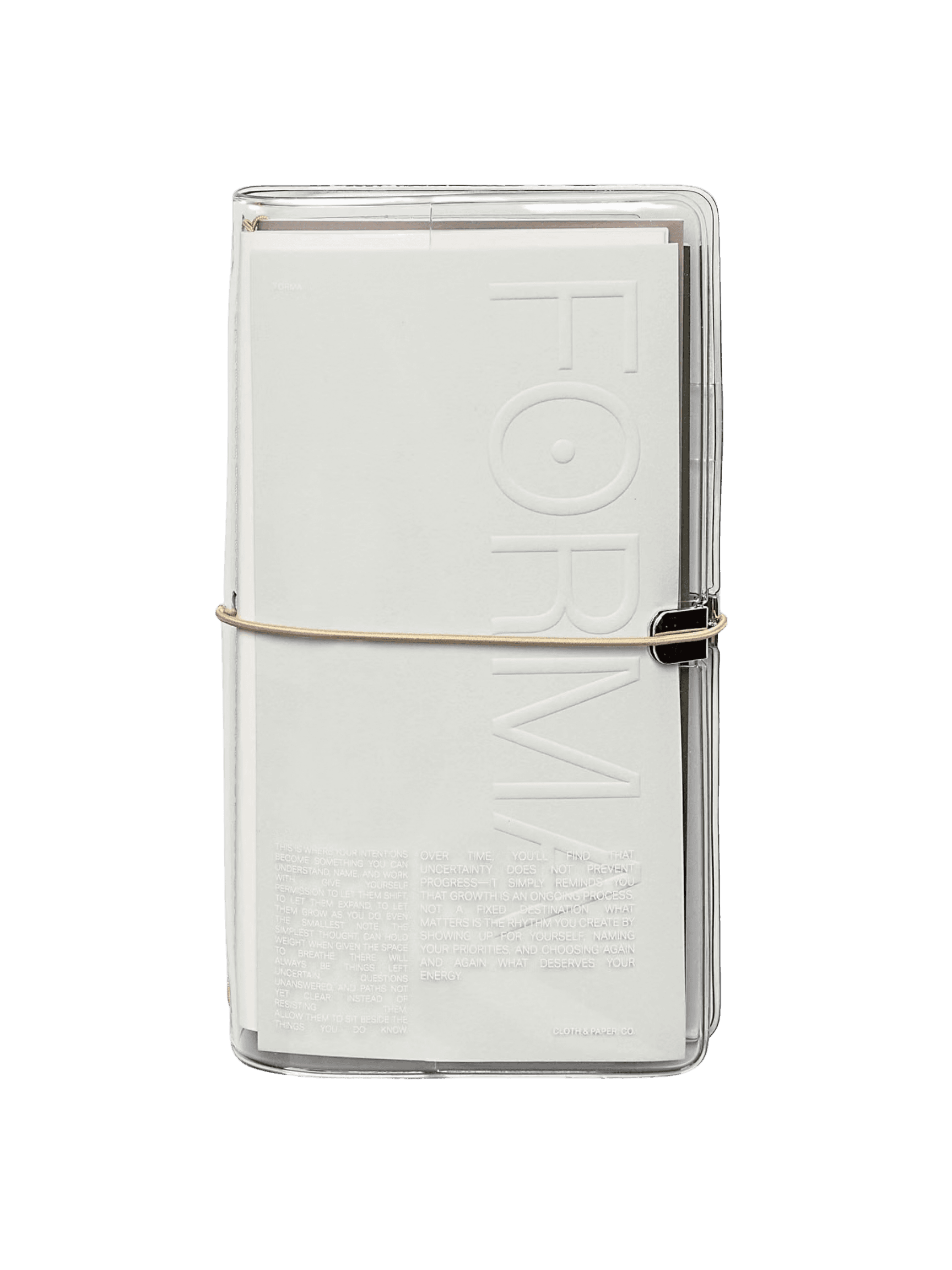 The Cloth & Paper FORMA notebook set in its clear vinyl travel case, with the FORMA name and reflective text embossed on the dashboard cover